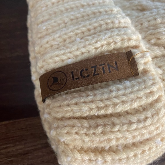 Woman’s Puff Fur Hand Knitted Beanie - Picture 8 of 11